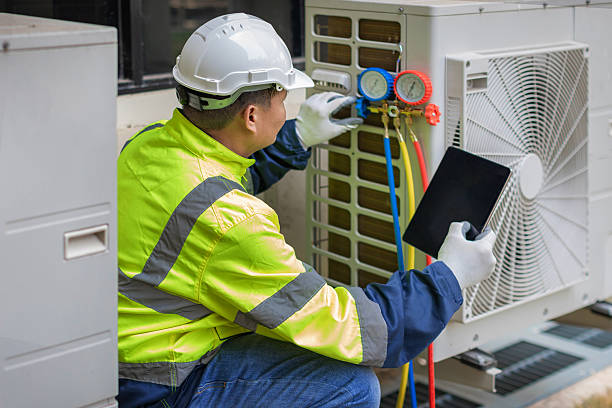 Professional Hvac technician working in Medway, OH